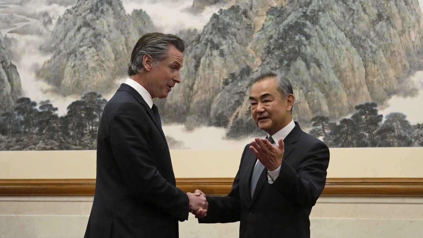 California Gov. Newsom has rare friendly exchange with China’s senior diplomat Wang Yi | AP News