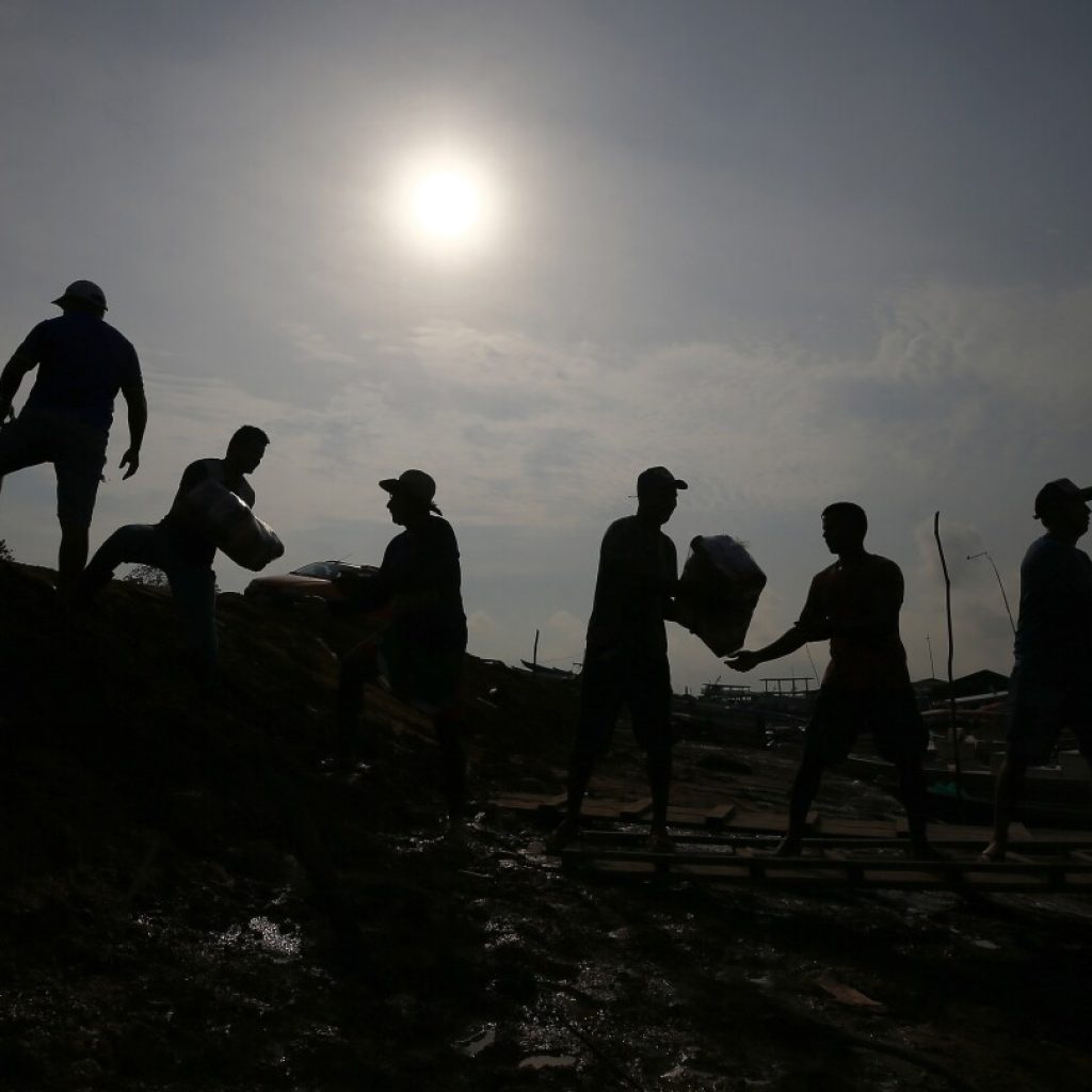 In the Amazon, communities next to the world’s most voluminous river are queuing for water | AP News