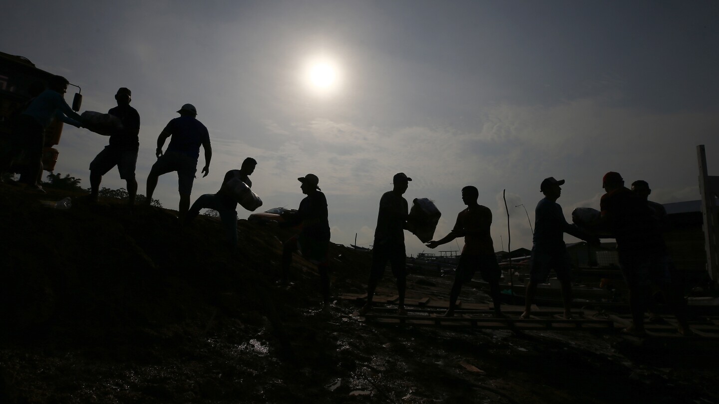 In the Amazon, communities next to the world’s most voluminous river are queuing for water | AP News