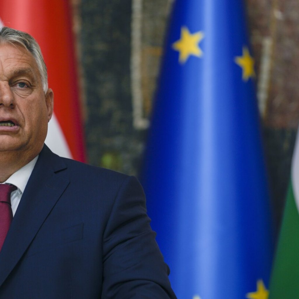 Fresh off a hearty Putin handshake, Orban heads into an EU summit on Ukraine | AP News