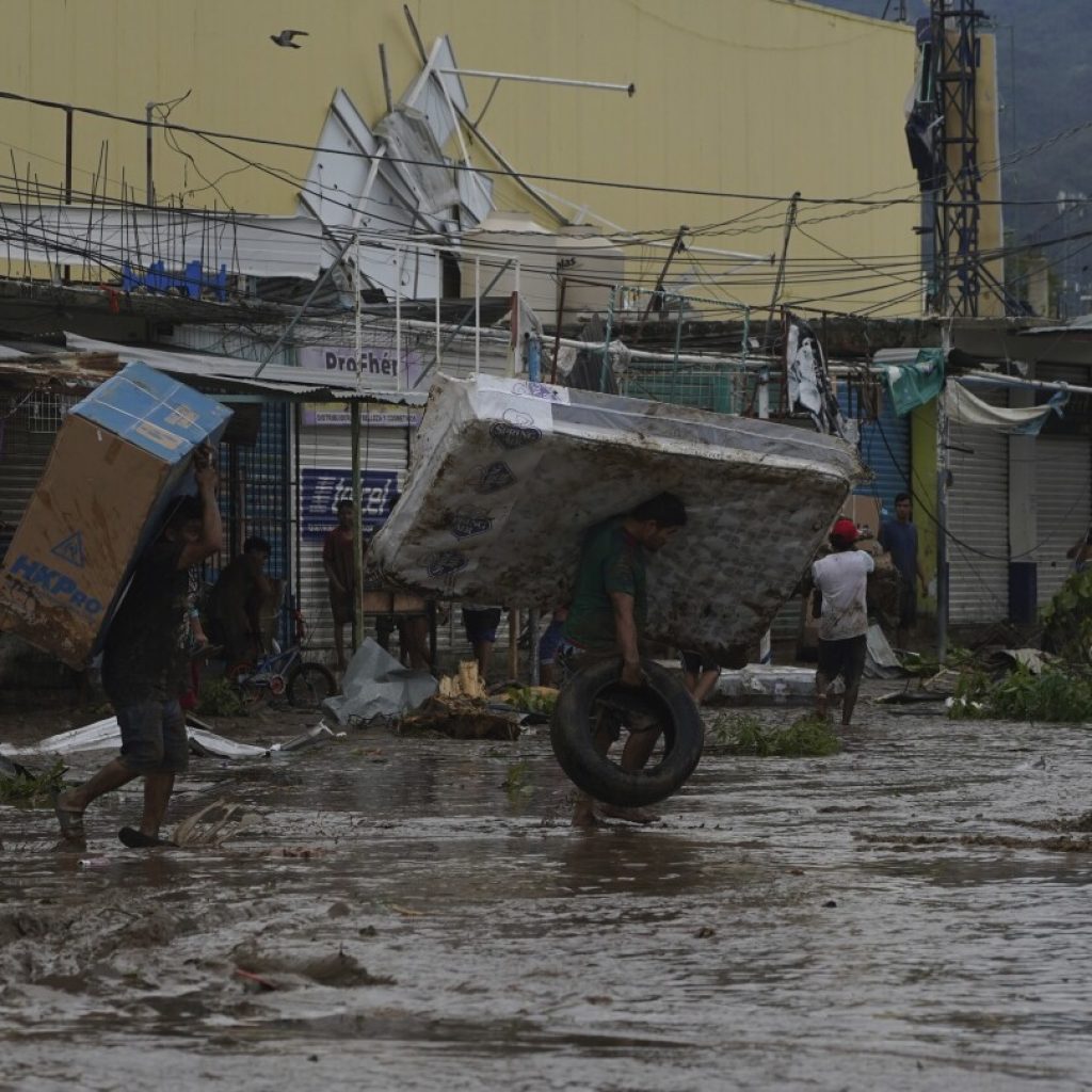 Acapulco residents are left in flooded and windblown chaos with hurricane’s toll still unknown | AP News