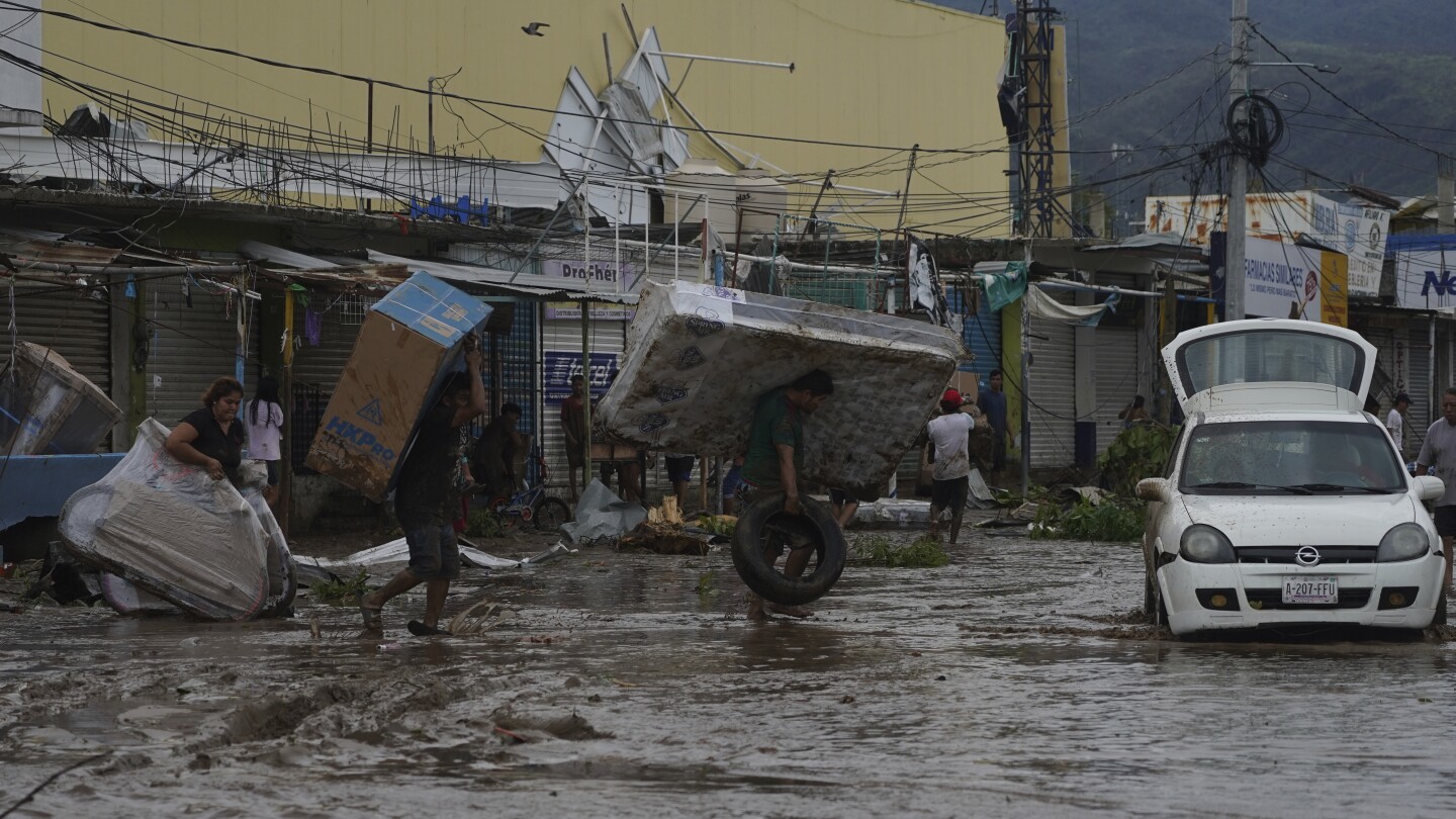 Acapulco residents are left in flooded and windblown chaos with hurricane’s toll still unknown | AP News