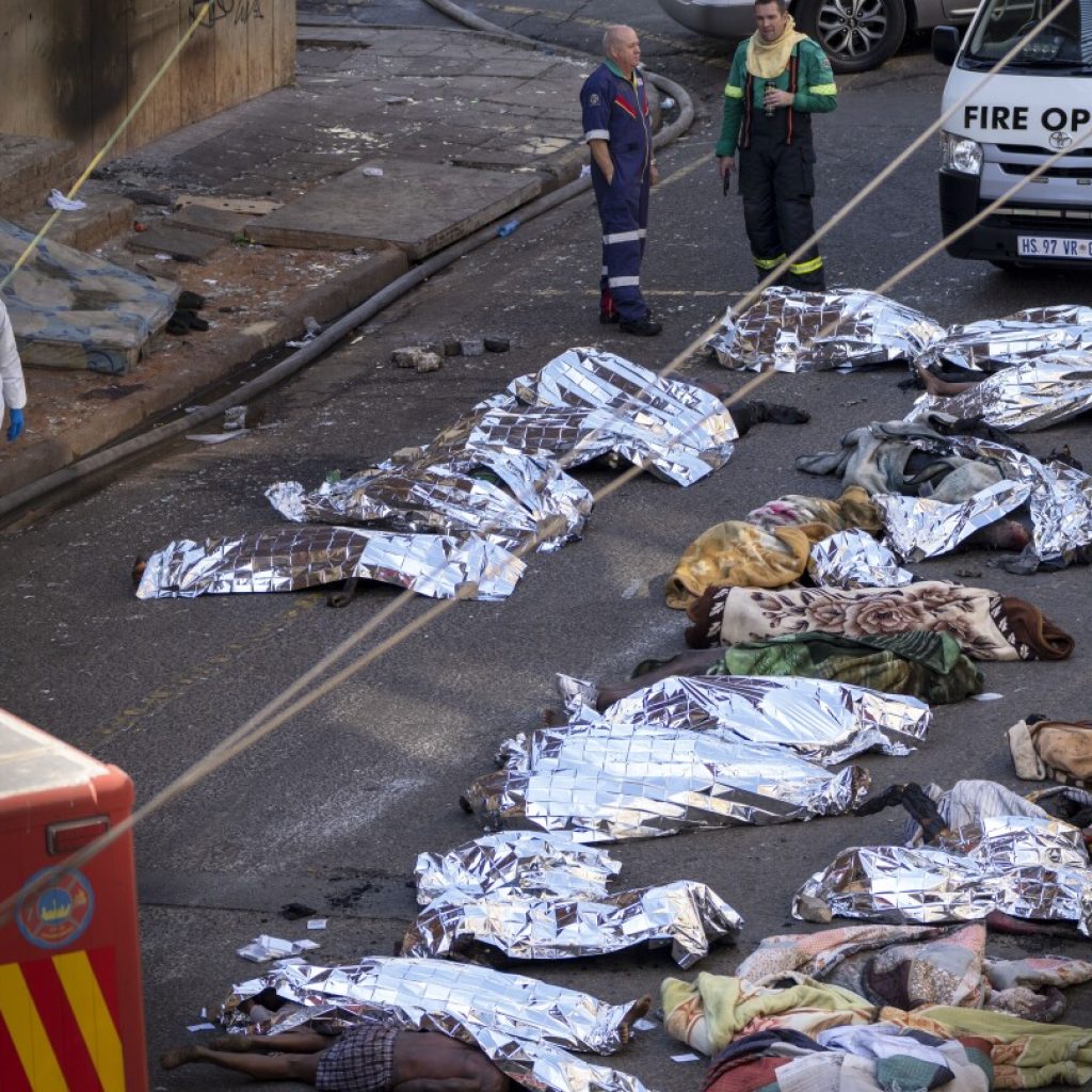 South Africa begins an inquiry into a building fire that killed 76 people in Johannesburg in August | AP News