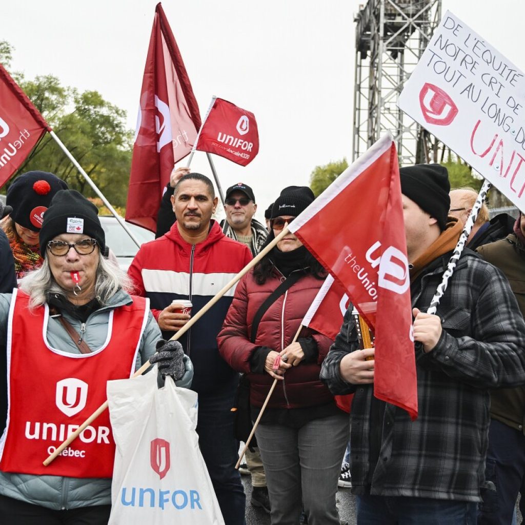 Strikers have shut down a vital Great Lakes shipping artery for days, and negotiations are looming | AP News