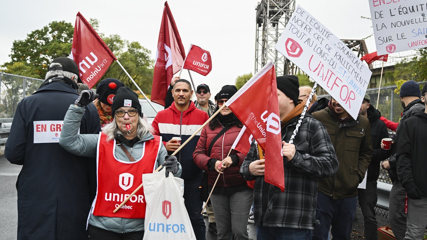 Strikers have shut down a vital Great Lakes shipping artery for days, and negotiations are looming | AP News