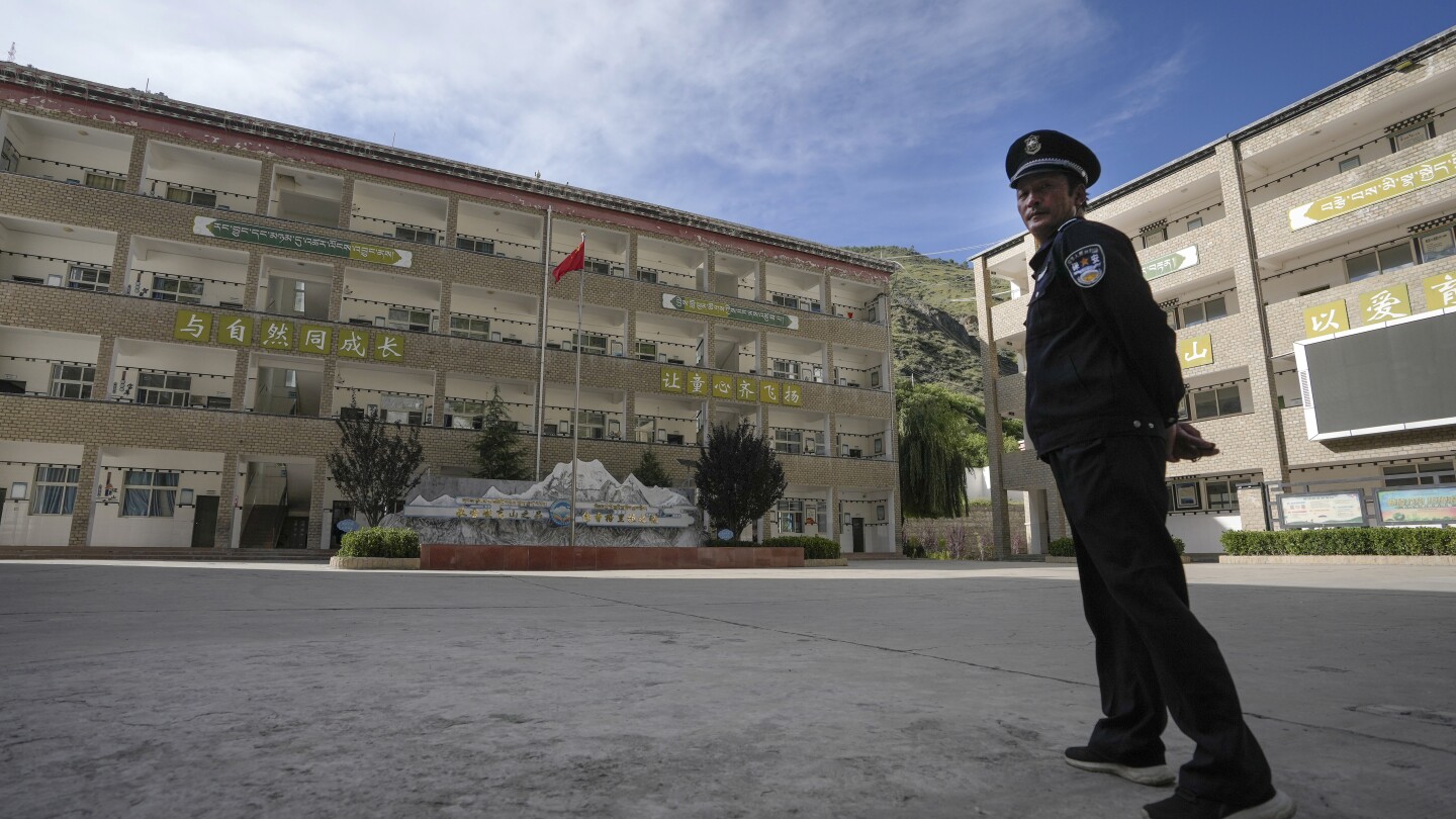 China shows off a Tibetan boarding school that’s part of a system some see as forced assimilation | AP News