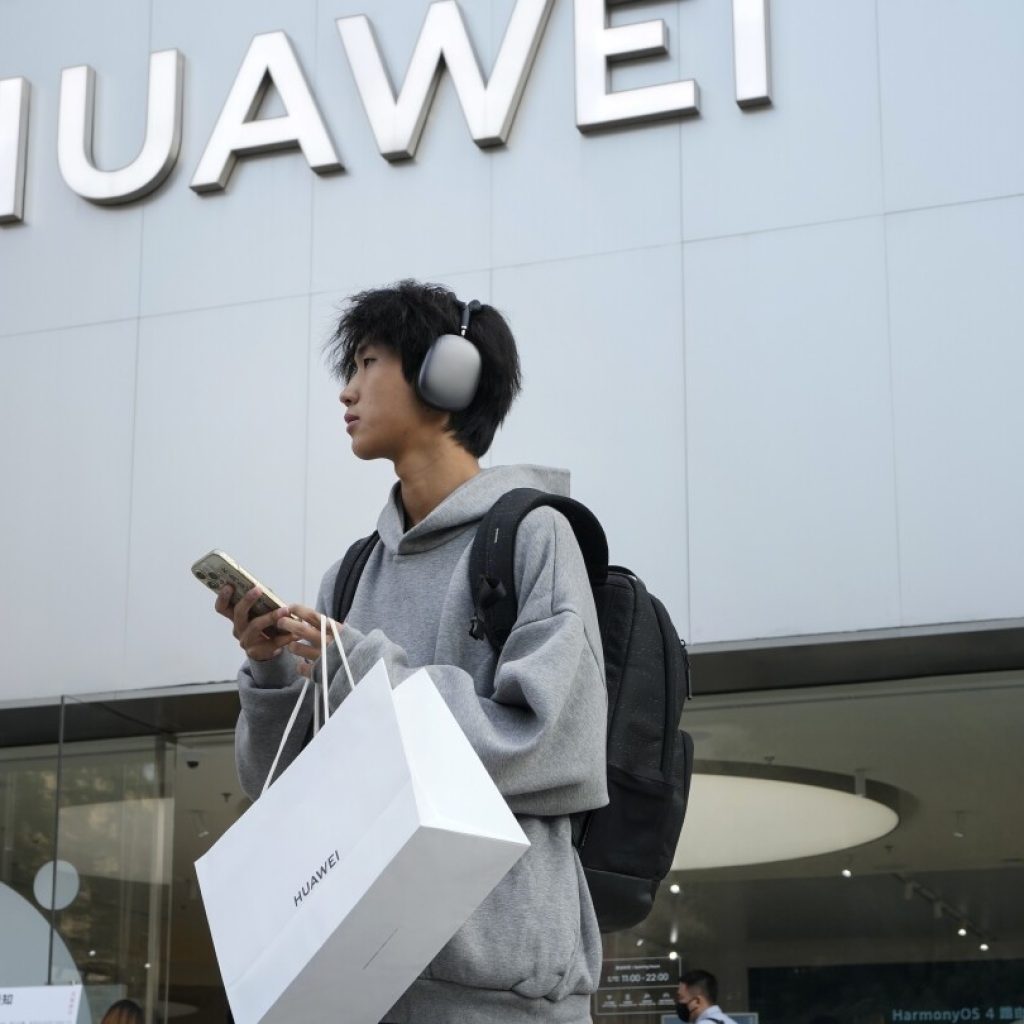 Huawei reports its revenue inched higher in January-September despite US sanctions | AP News