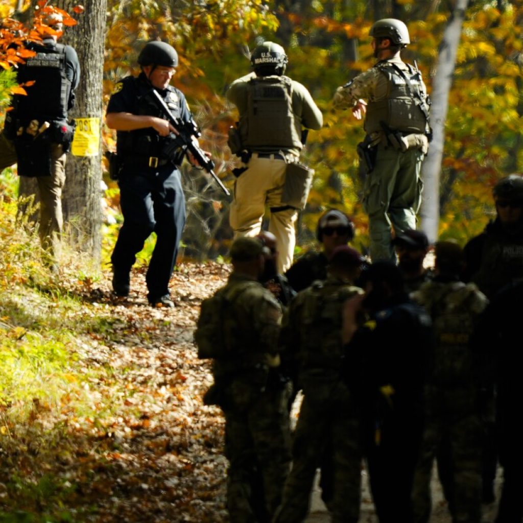 Maine embarks on healing and searches for answers a day after mass killing suspect is found dead | AP News