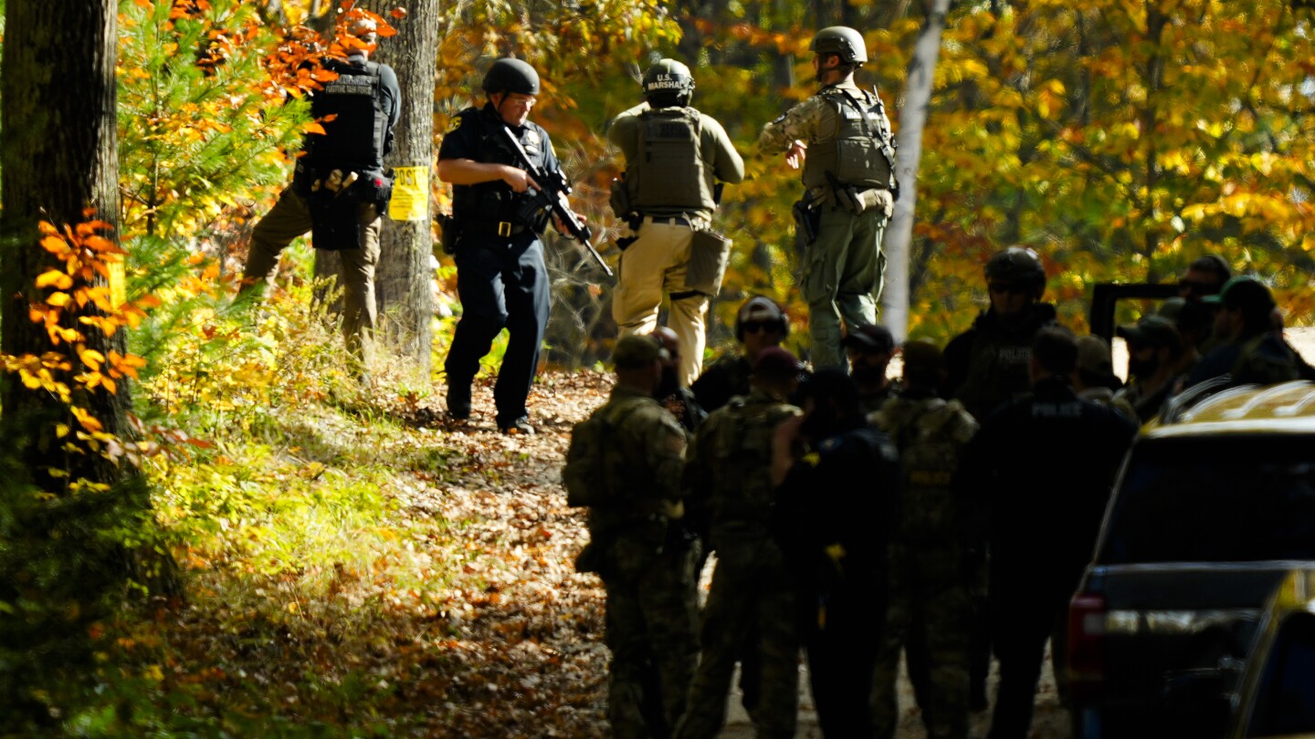 Maine embarks on healing and searches for answers a day after mass killing suspect is found dead | AP News