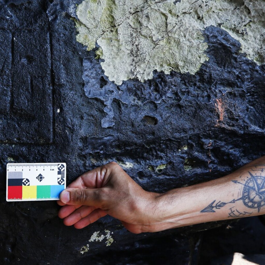 Severe drought in the Amazon reveals millennia-old carvings | AP News