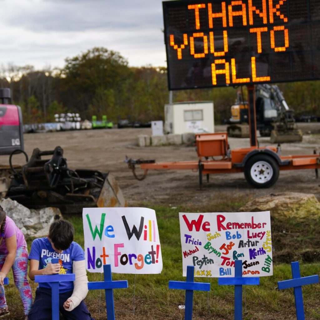 Residents of Maine gather to pray and reflect, four days after a mass shooting left 18 dead | AP News