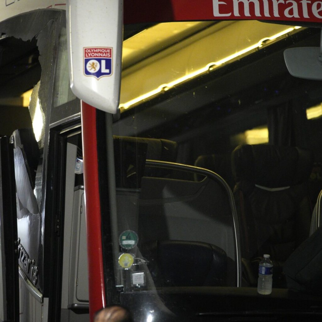 Coach Fabio Grosso hurt as Lyon team bus comes under attack before French league game at Marseille | AP News