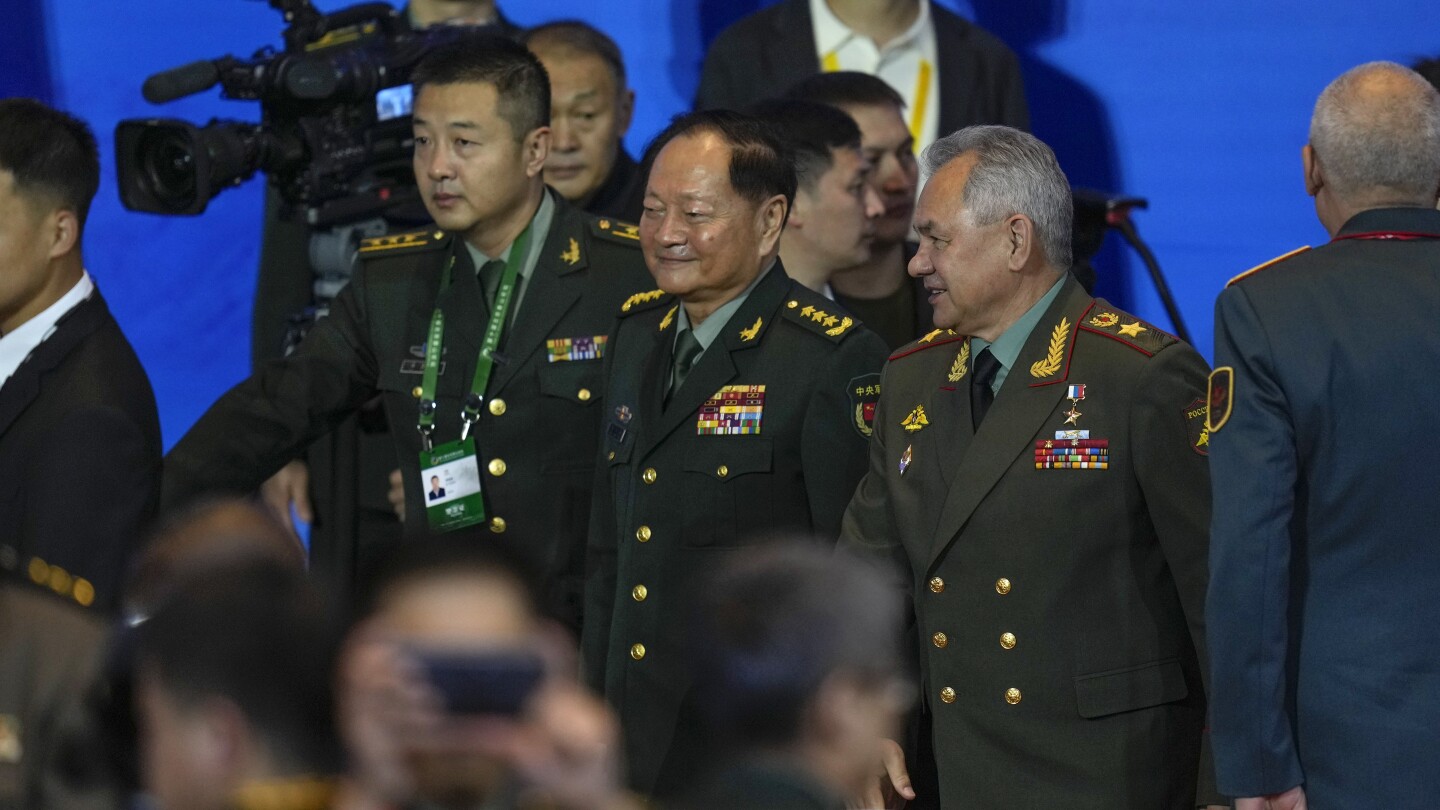 At China military forum, Russian defense minister accuses the US of fueling geopolitical tensions | AP News