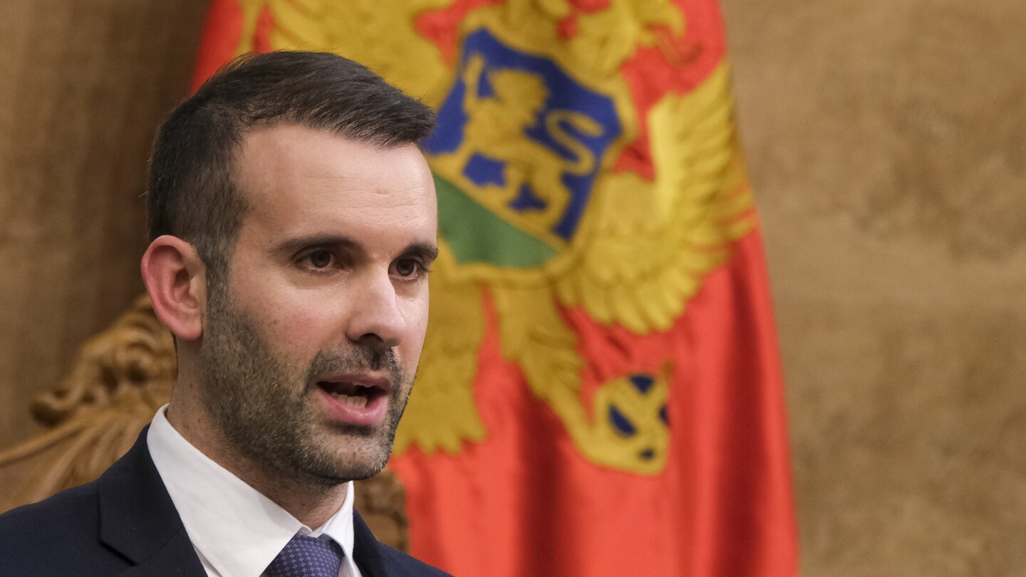 Montenegro gets new government, promises to unblock EU integration as EU Commissioner visits | AP News