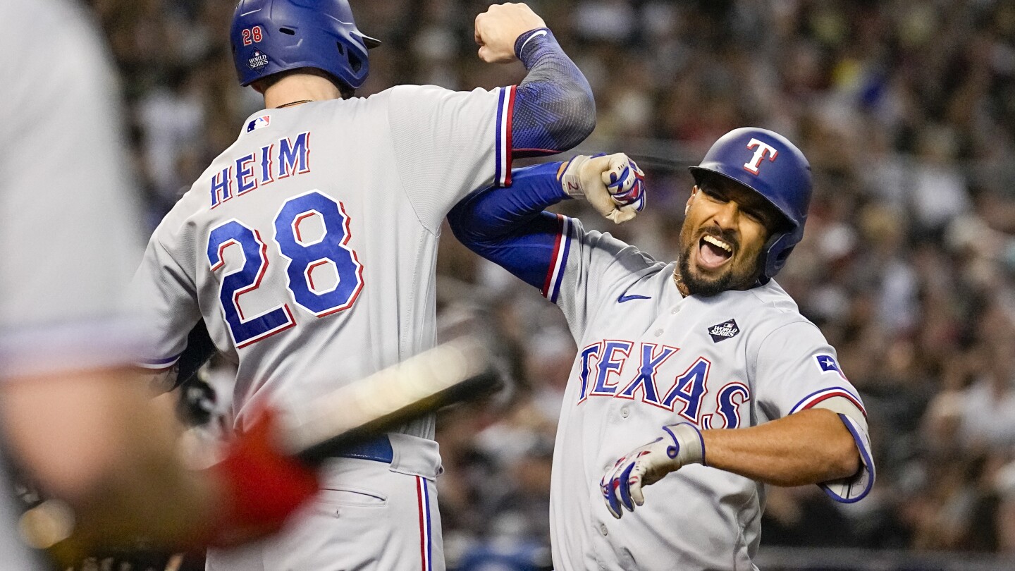 Semien’s 5 RBIs, Seager’s home run lead Rangers over Diamondbacks 11-7 for 3-1 World Series lead | AP News