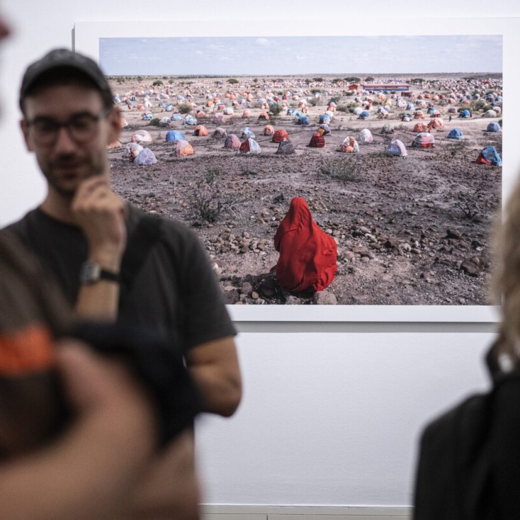 Hungary bans teenagers from visiting World Press Photo exhibition over display of LGBTQ+ images | AP News