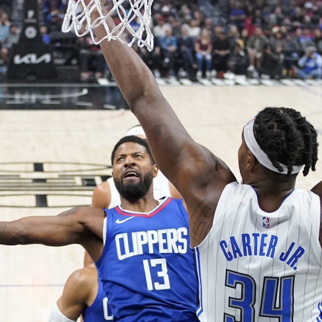 With James Harden watching, Clippers take control in 3rd quarter to beat Magic 118-102 | AP News