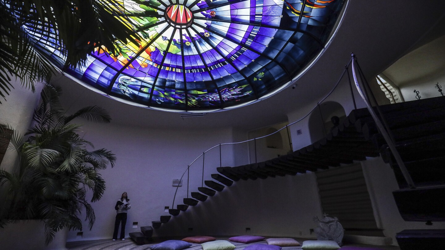 Renowned glass artist and the making of a football field-sized church window featured in new film | AP News