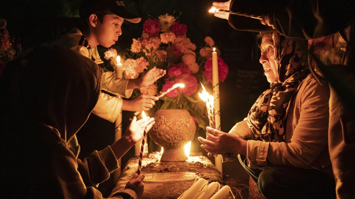 With flowers, altars and candles, Mexicans are honoring deceased relatives on the Day of the Dead | AP News