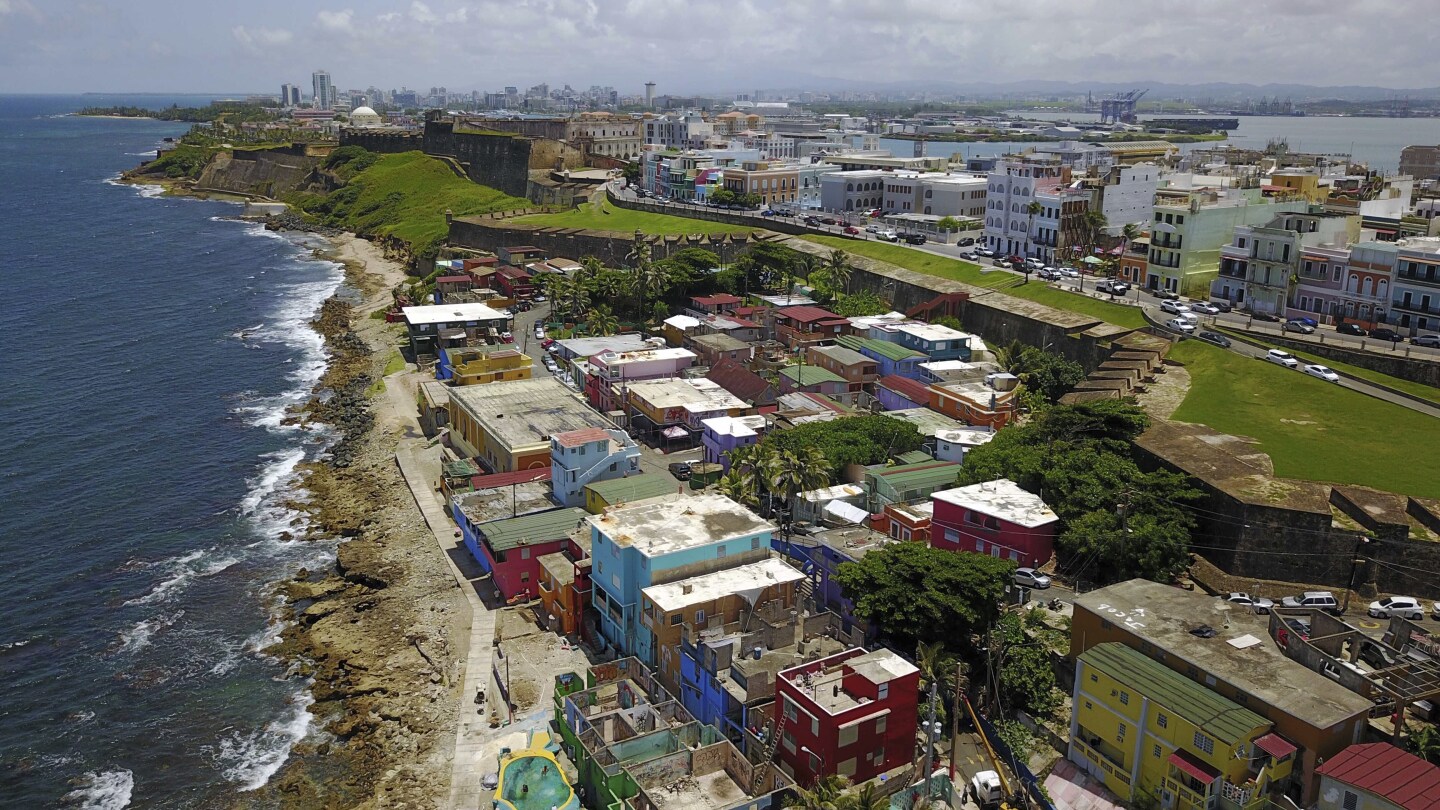 US announces $440 million to install solar panels on low-income homes in Puerto Rico | AP News