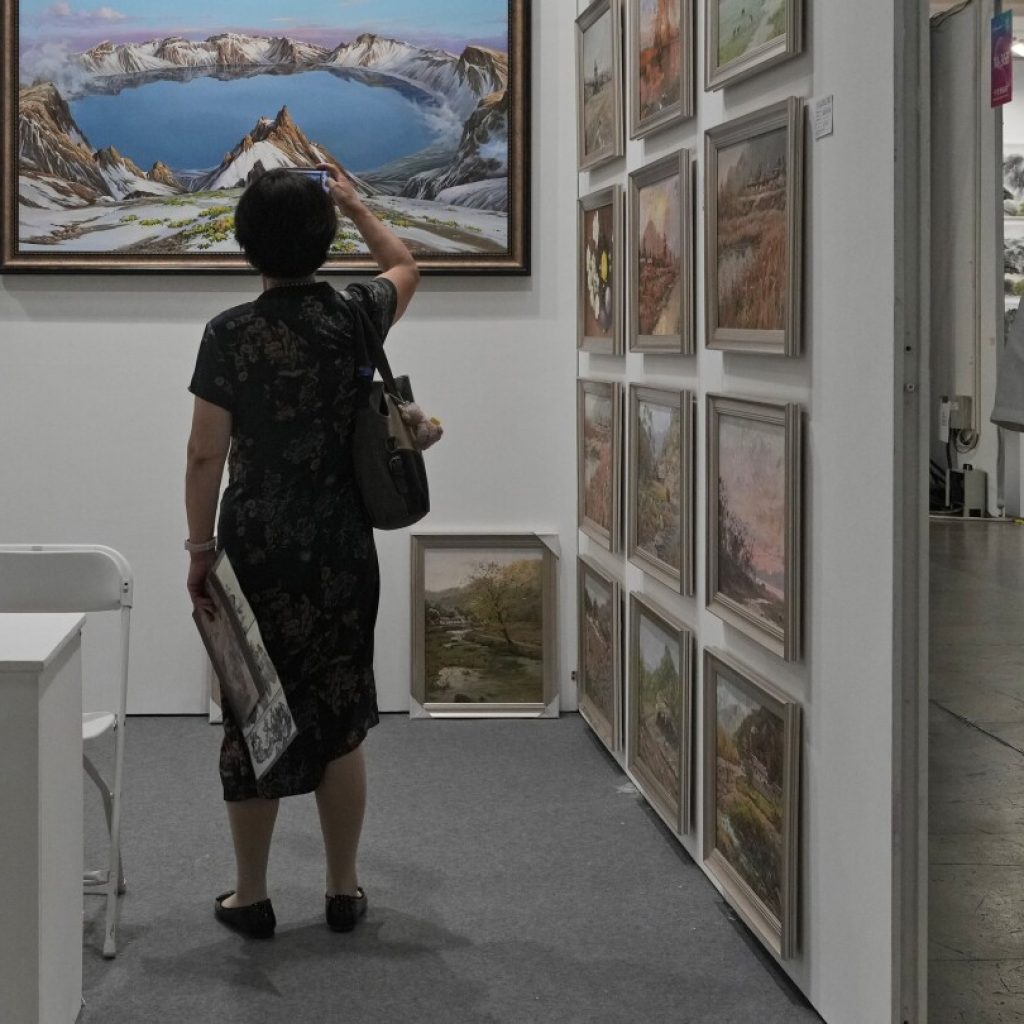 North Korean art sells in China despite UN sanctions over nuclear program | AP News