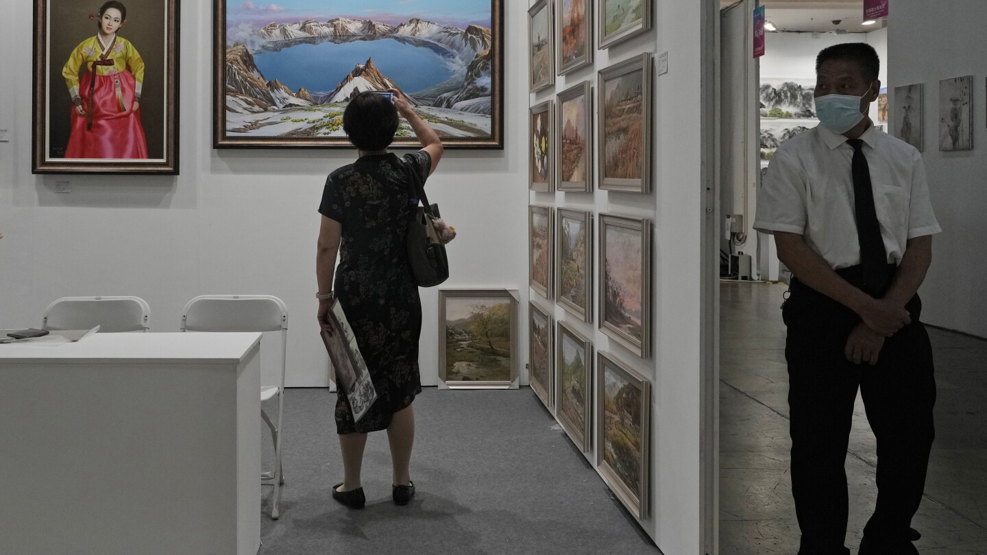 North Korean art sells in China despite UN sanctions over nuclear program | AP News