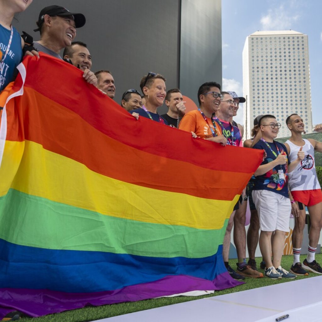 Supporters celebrate opening of Gay Games in Hong Kong, first in Asia, despite lawmakers’ opposition | AP News