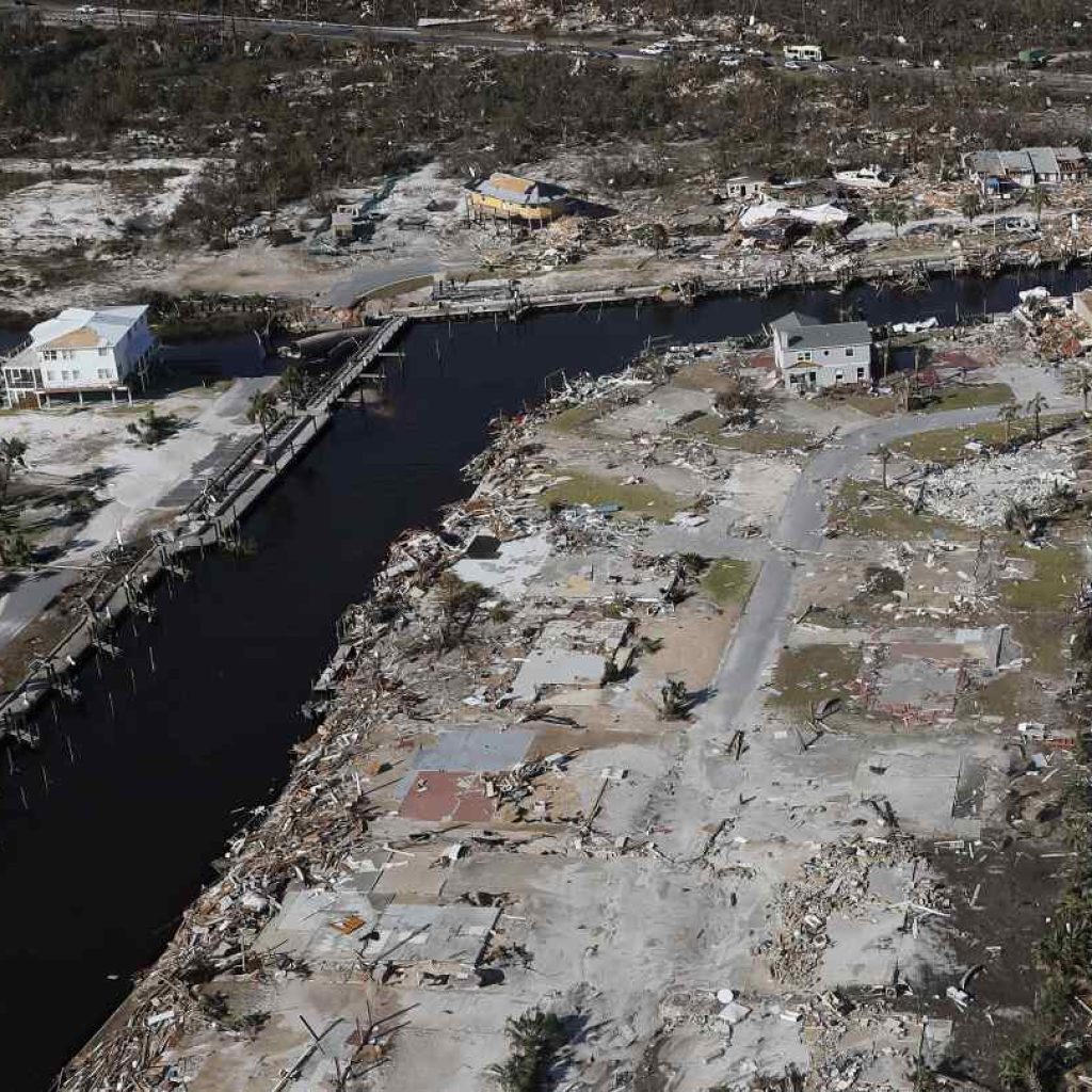 Some houses are being built to stand up to hurricanes and sharply cut emissions, too | AP News