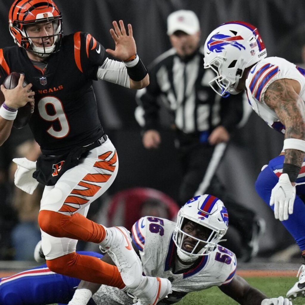 Burrow passes for 348 yards and 2 TDs and Bengals’ defense clamps down on Bills in 24-18 win | AP News