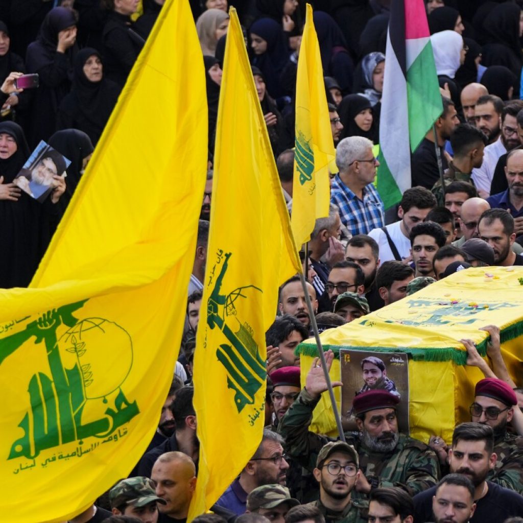 Hezbollah and Hamas’ military wings in Lebanon exchange fire with Israel. Tension rises along border | AP News