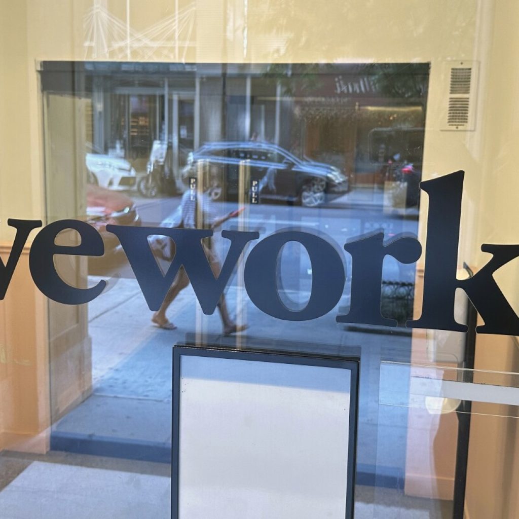 WeWork files for bankruptcy protection in stunning fall | AP News