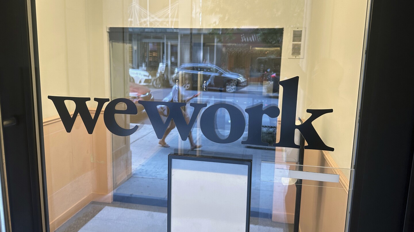 WeWork files for bankruptcy protection in stunning fall | AP News