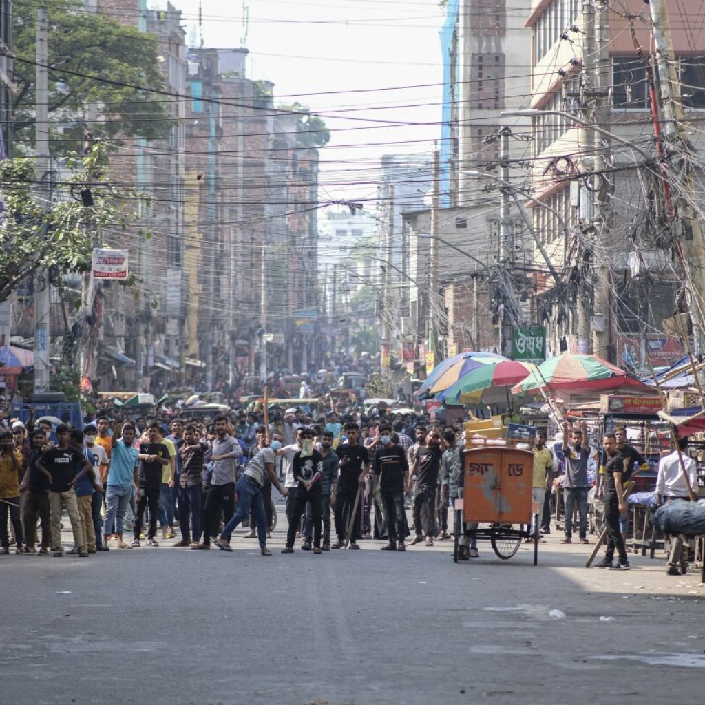 Bangladesh raises monthly minimum wage for garment workers to $113 following weeks of protests | AP News