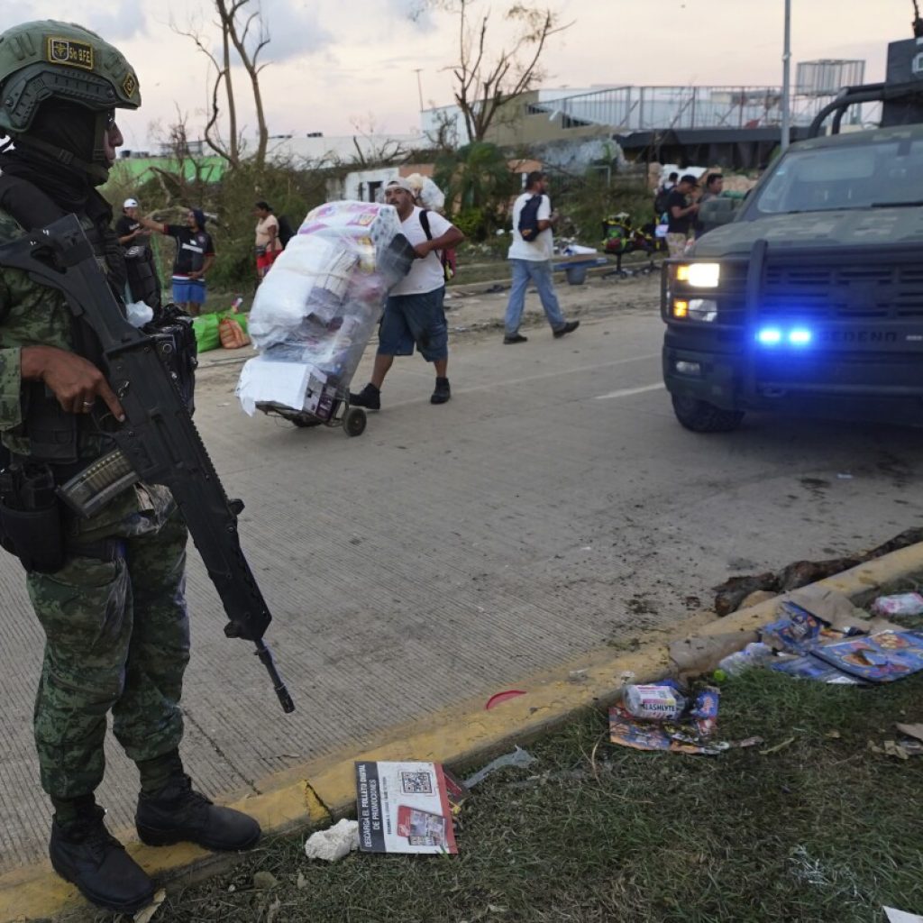 Mexico’s hurricane reconstruction plans prioritize military barracks, owners left to rebuild hotels | AP News