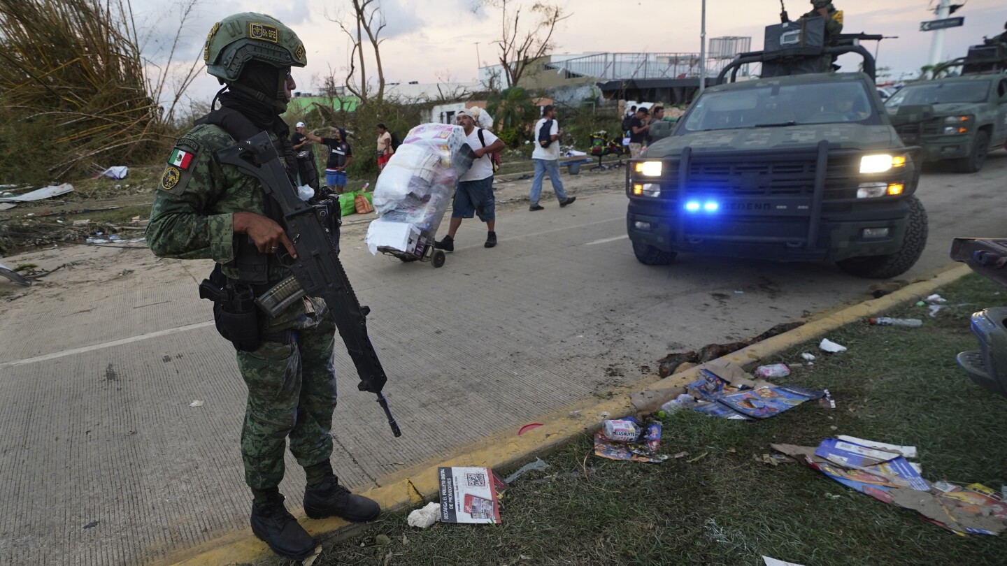 Mexico’s hurricane reconstruction plans prioritize military barracks, owners left to rebuild hotels | AP News