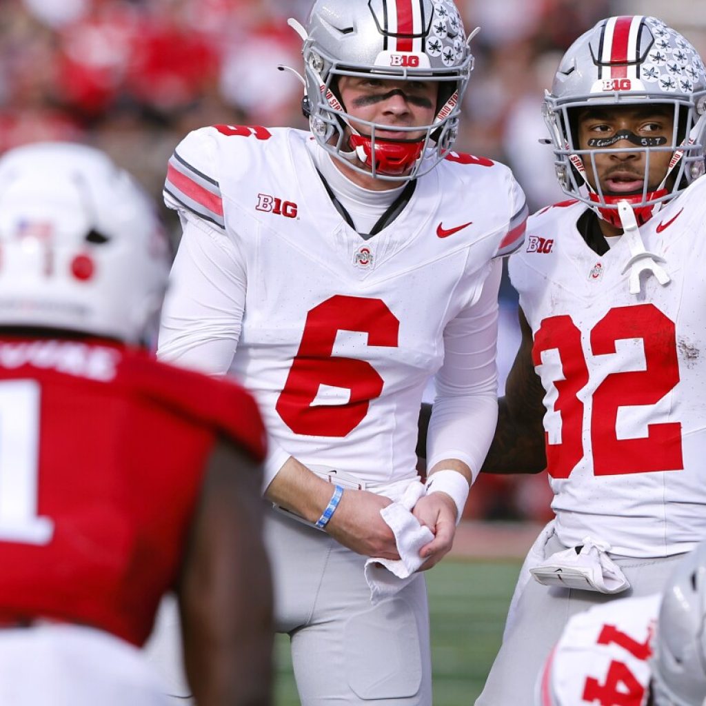 Ohio State remains No. 1, followed by Georgia, Michigan, Florida State, as CFP rankings stand pat | AP News