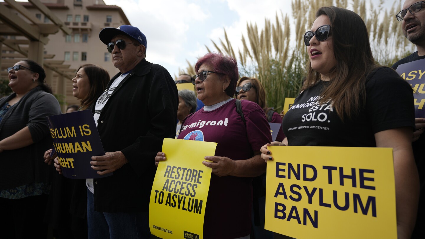 Biden administration warns of major disruption at border if judges halt asylum rule | AP News