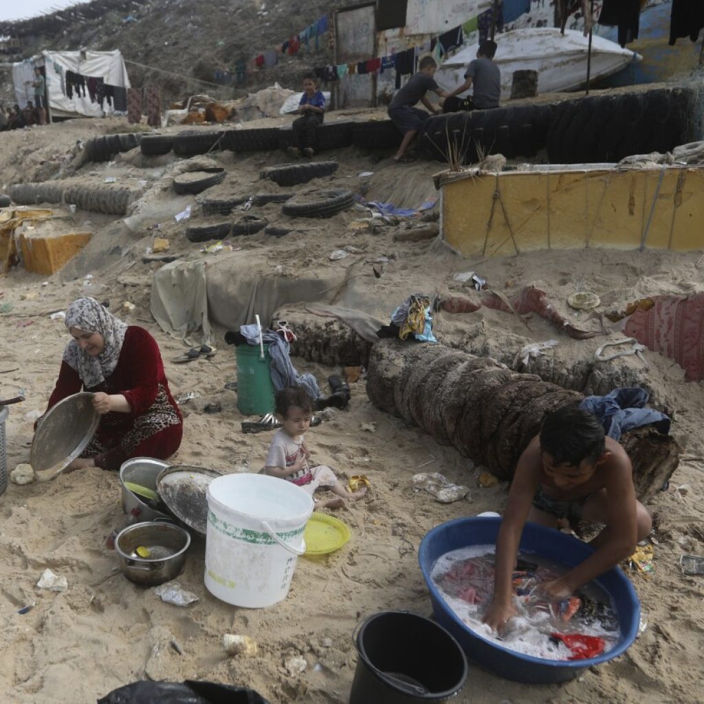 Fights in bread lines, despair in shelters: War threatens to unravel Gaza’s close-knit society | AP News