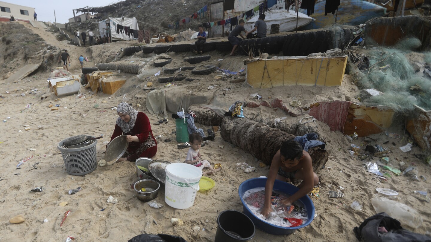 Fights in bread lines, despair in shelters: War threatens to unravel Gaza’s close-knit society | AP News