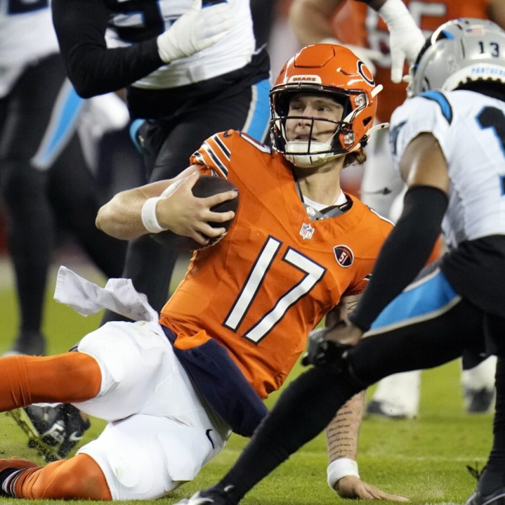 Foreman runs for TD, Bears beat Panthers 16-13 to boost their shot at the top pick in the draft | AP News