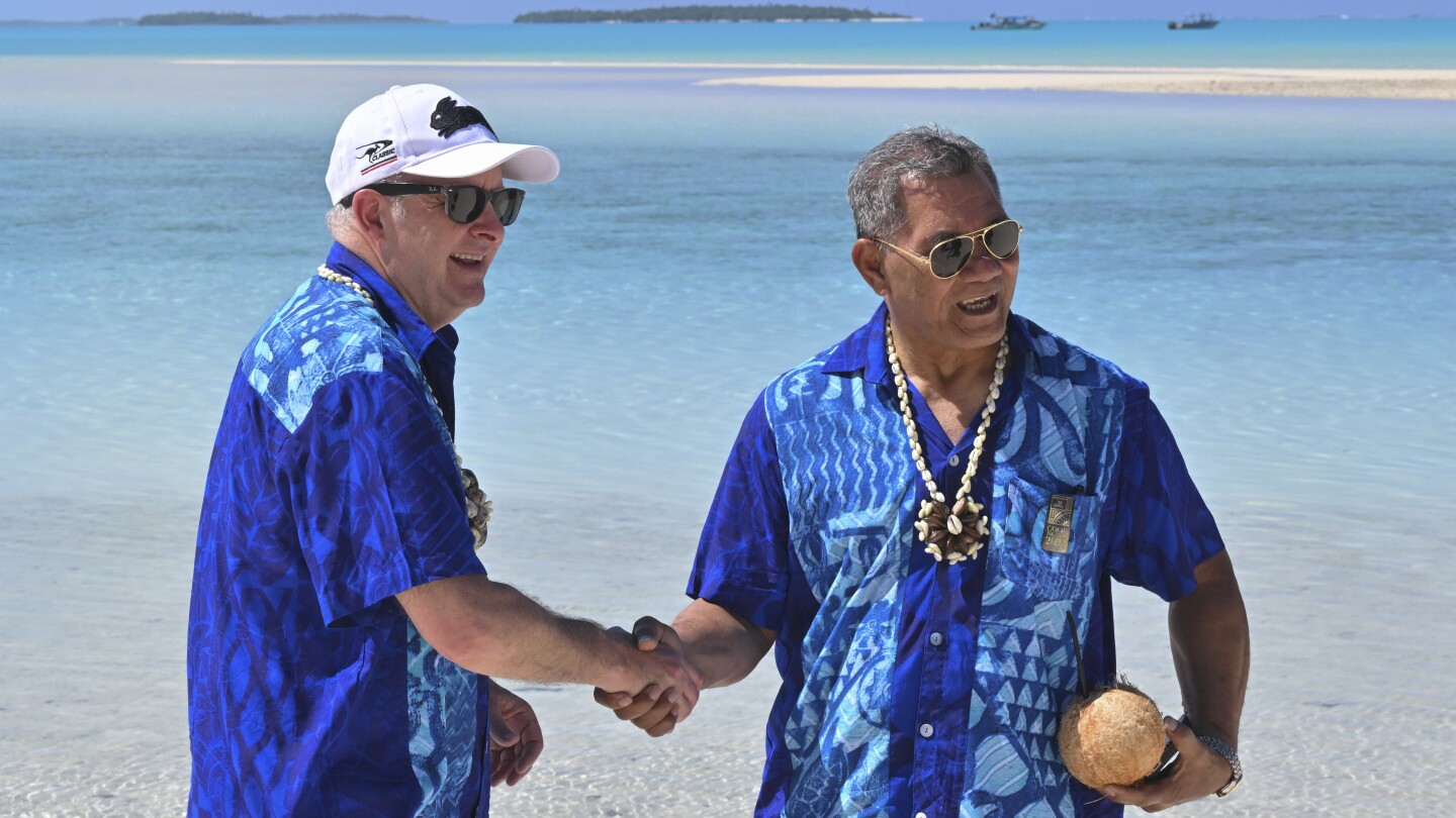 Australia offers to help Tuvalu residents escape rising seas and other ravages of climate change | AP News