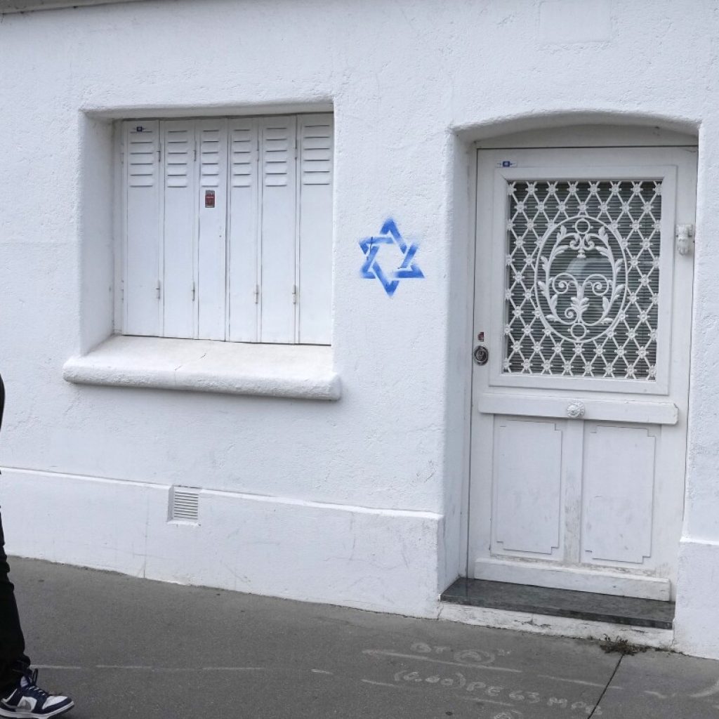 France blames Russia for a digital effort to whip up online controversy over Stars of David graffiti | AP News