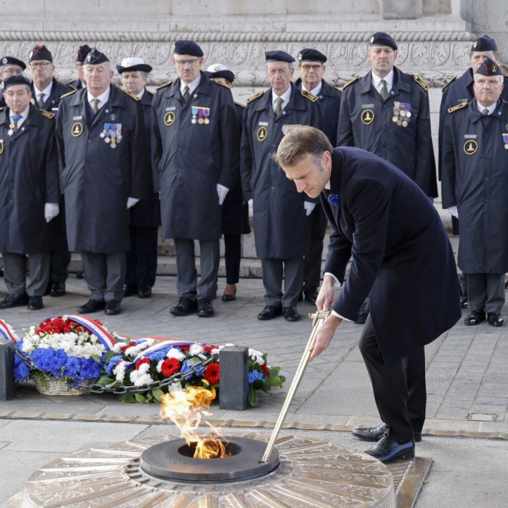 Somber bugles and bells mark Armistice Day around the globe as wars drown out peace messages | AP News