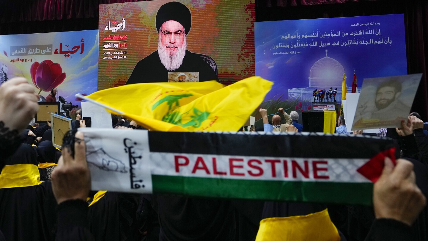 Hezbollah says it is introducing new weapons in ongoing battles with Israeli troops | AP News