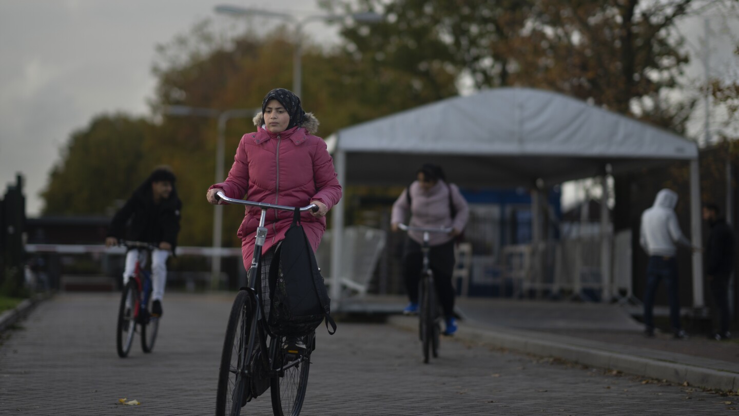 Dutch election candidates make migration a key campaign issue in the crowded Netherlands | AP News