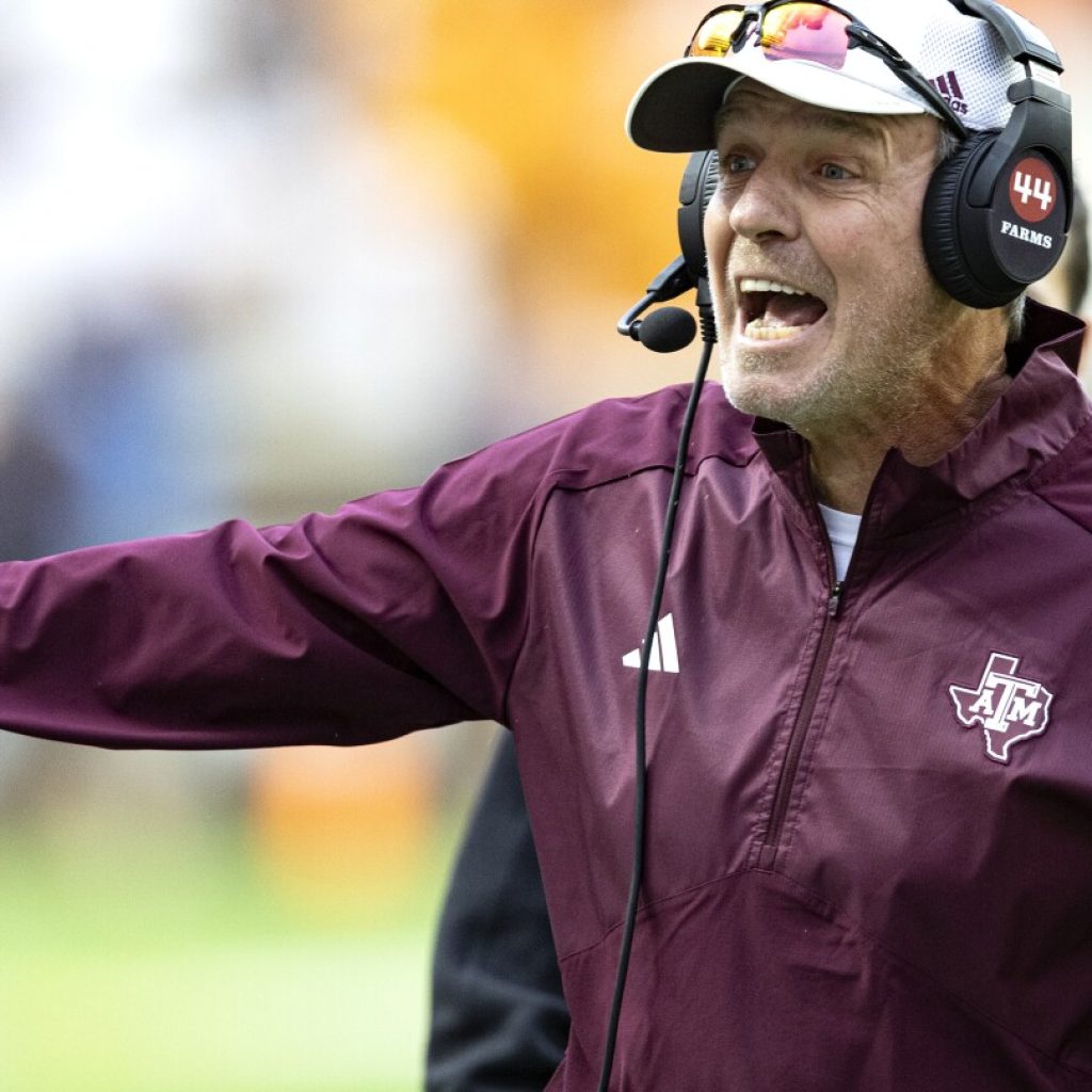 Texas A&M fires coach Jimbo Fisher, a move that will cost the school $75M | AP News