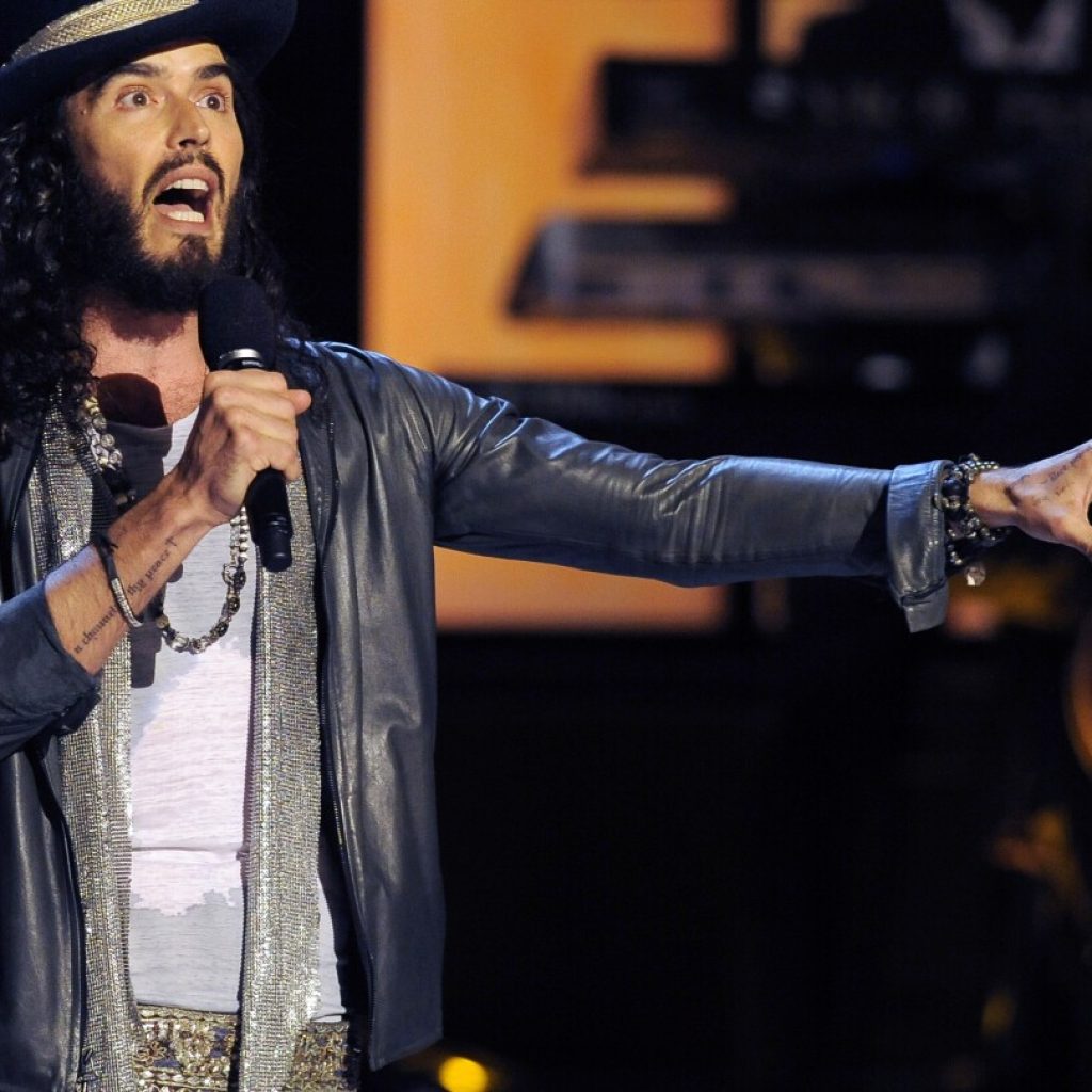 BBC says 2 more people have come forward to complain about Russell Brand’s behavior | AP News