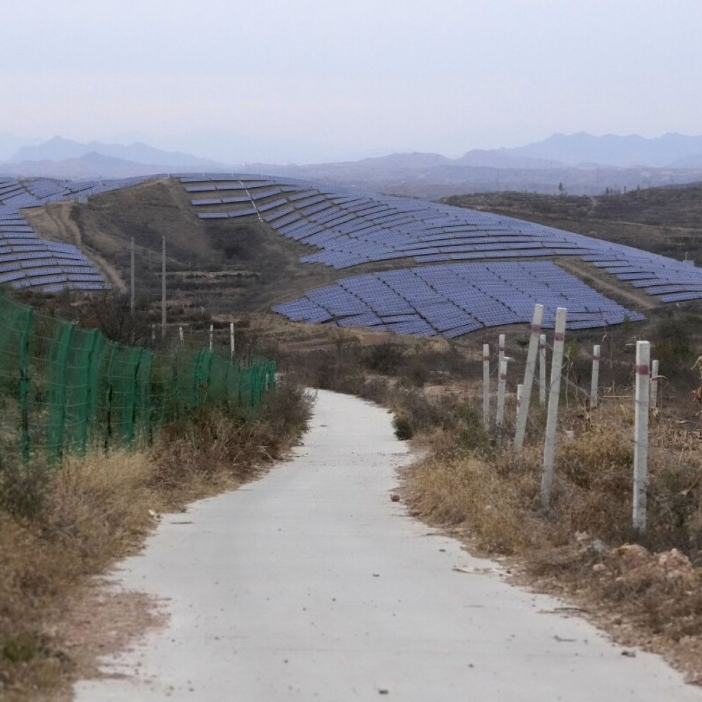 Asian economies must ramp up wind and solar power to keep global warming under 1.5C, report says | AP News