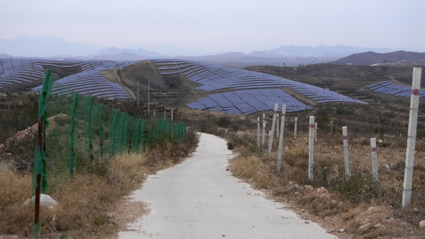 Asian economies must ramp up wind and solar power to keep global warming under 1.5C, report says | AP News