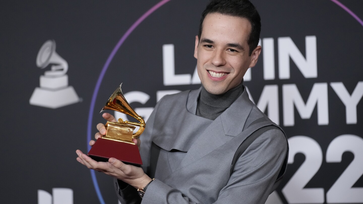 Édgar Barrera is the producer behind your favorite hits — and the Latin Grammys’ top nominee | AP News